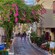 An alleyway in the neighborhood of Plaka in Athens featuring rustic buildings